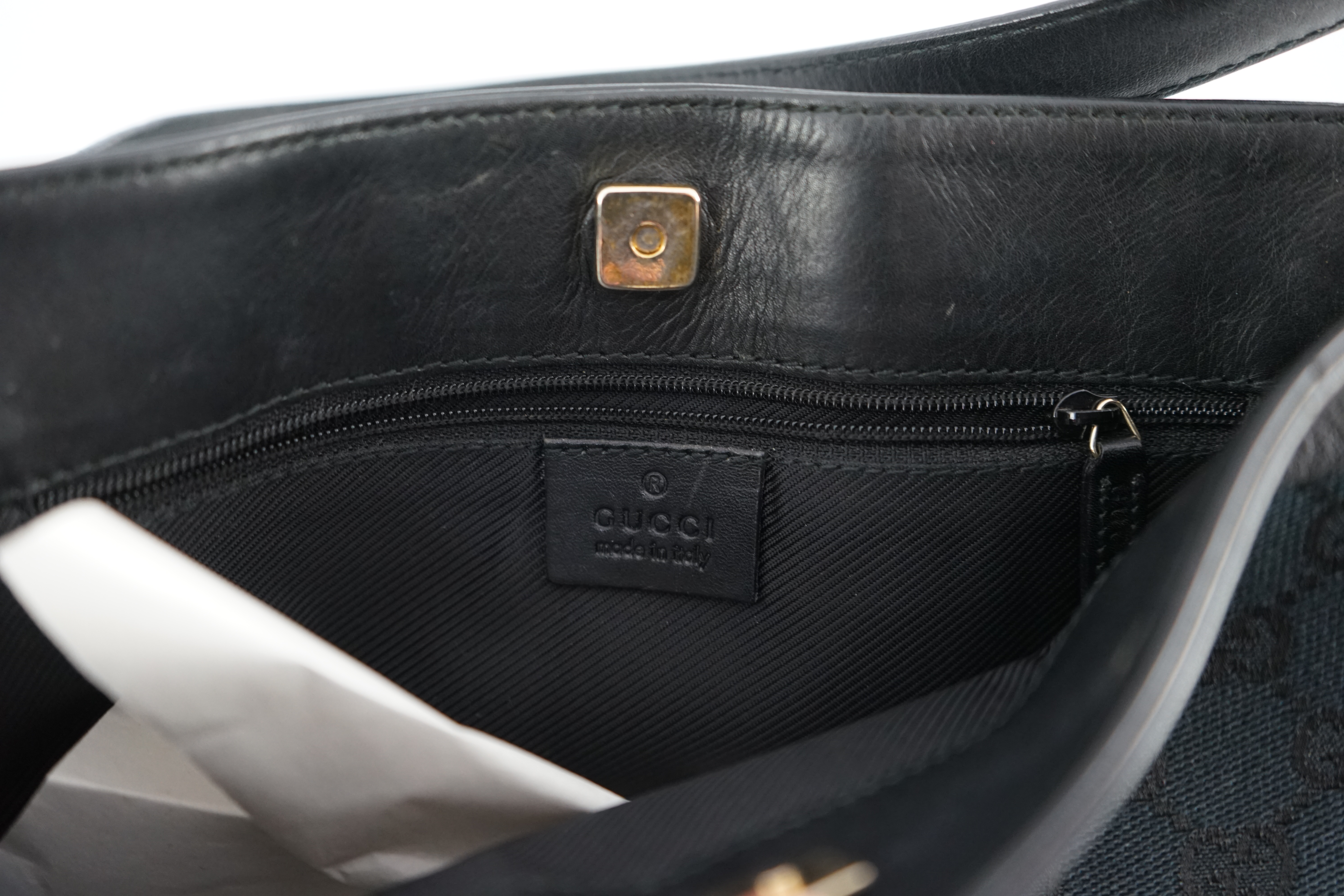 A Gucci black GG canvas shoulder bag width 26cm, depth 6cm, approx height 25cm